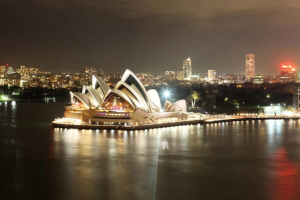Sydney Harbour in the evening with lights on