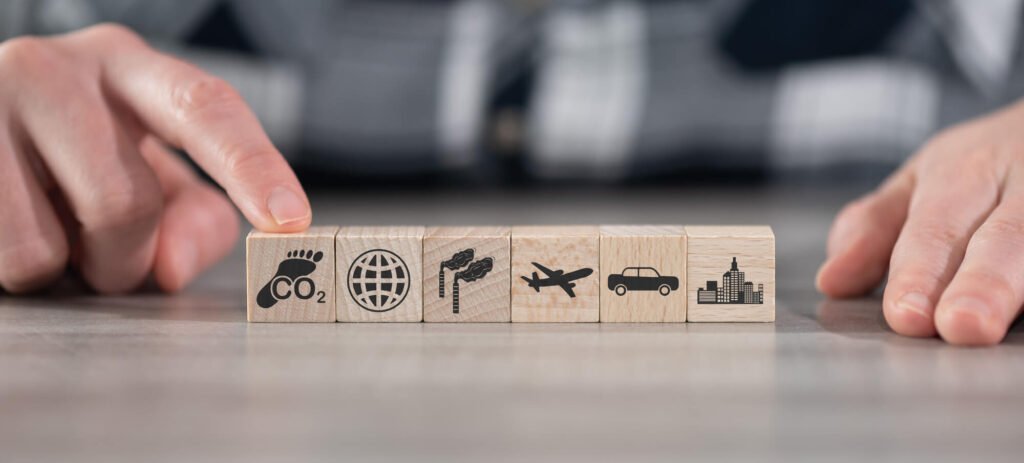 Concept of air pollution with icons on wooden cubes